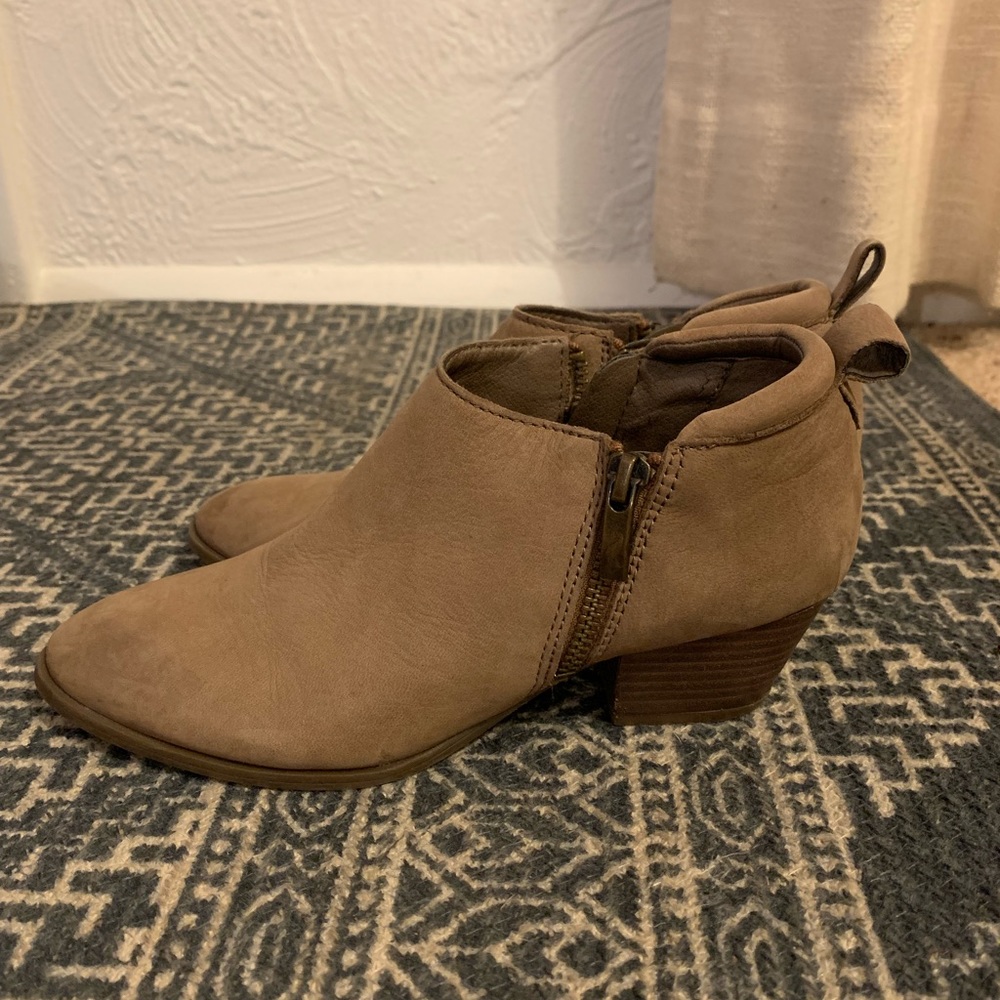 Franco Sarto tan zip up booties. Distressed toe, low heel for extra comfort.